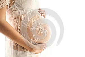 Beautiful adult pregnant woman. Waiting for the baby. Pregnancy. Care, tenderness, motherhood, childbirth. White