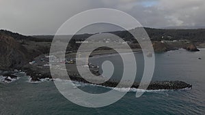 Beautiful aerial of dolly dock in Port Orford, Oregon