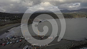 Beautiful aerial of dolly dock in Port Orford, Oregon