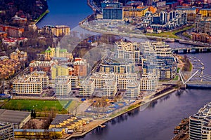 Beautiful aerial panoramic view of the Neva River with some buildings of the city from a height, in the summer, St