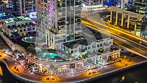 Beautiful aerial top view at night timelapse of Dubai Marina in Dubai, UAE