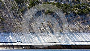 Beautiful aerial view from above on a winter track with driving cars