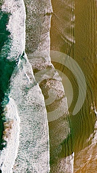 Beautiful aerial view of a beach with waves