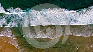 Beautiful aerial view of a beach with waves