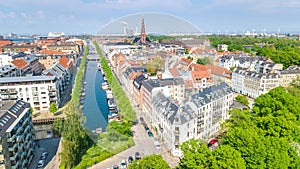 Beautiful aerial view of Copenhagen skyline from above, Nyhavn historical pier port and canal with color buildings and boats