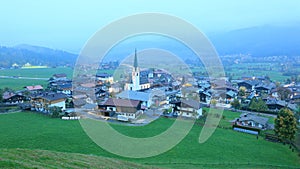 Beautiful aerial view of Ellmau at dusk, a small alpine village photo