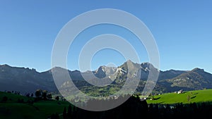 Beautiful aerial view of an inhabited valley captured on a sunny day