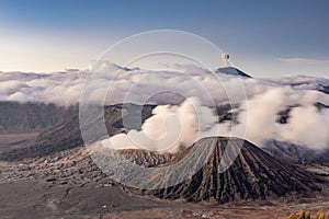 Beautiful aerial view of Mount BROMO with eruption and cloud background