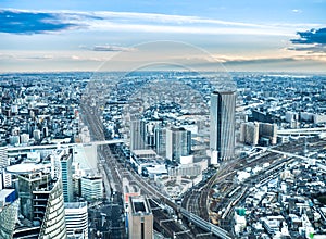 Beautiful aerial view of Nagoya city in Japan with tall buildings and blue skies