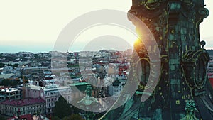 Beautiful aerial view of peaceful sunset over majestic old town skyline in Lviv, Ukraine near Latin Cathedral spire.