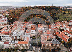 Beautiful aerial view of Prague city in Czech republic - historical part of old town and Petrin Hill in autumn time - taken by