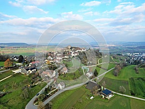 Beautiful aerial view of the Regensberg Castle with front fields and buildings
