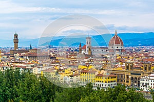 Beautiful aerial view of Santa Maria del Fiore and Palazzo Vecchio in Florence, Italy...IMAGE