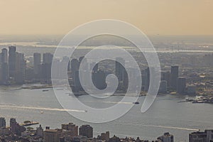 Beautiful aerial view of skyscrapers against backdrop of landscape of Hudson River and Manhattan. New York,