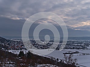 Beautiful aerial view of small village Hirschau, part of TÃÂ¼bingen, Germany in winter with houses surrounded by fields. photo