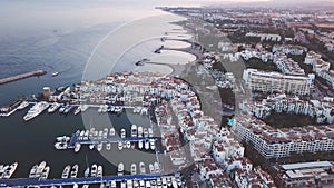 Beautiful aerial view of sunset over Puerto Banus Bay, Marbella , Spain