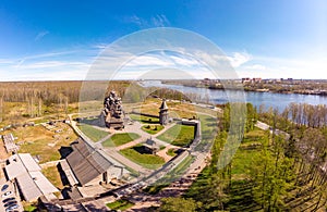 Beautiful Aerial view to traditional Russian village with orthodox wooden chapel and bell tower in Bogoslovka manor