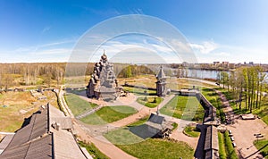 Beautiful Aerial view to traditional Russian village with orthodox wooden chapel and bell tower in Bogoslovka manor