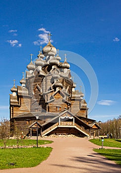 Beautiful Aerial view to traditional Russian village with orthodox wooden chapel and bell tower in Bogoslovka manor