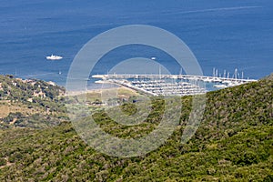 Beautiful aerial view of the tourist port of Cala Galera in the naturalistic area of Monte Argentario, Grosseto, Italy