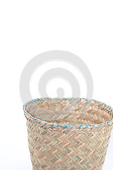 Beautiful aesthetic basket on an isolated white background. baskets of dry grass, handmade by local Indonesians.