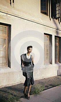 Beautiful African American model smiling turning head