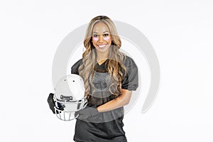 Beautiful African American Model Wearing A Football Helmet And Holding A Football