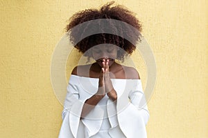 A beautiful African American prays