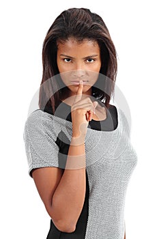 Beautiful african american woman with the finger on lips