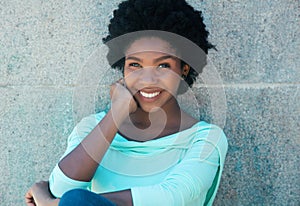 Beautiful african american woman in a light green shirt