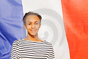 Beautiful African teenage girl with French flag