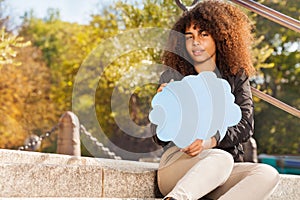 Beautiful African teenage girl with speech cloud