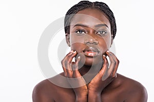 Beautiful african woman face close up portrait studio on white background