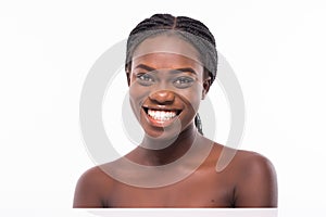 Beautiful african woman female skin care healthy hair and skin close up face beauty portrait isolated on white background