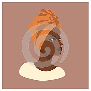 Beautiful African woman with an orange headdress