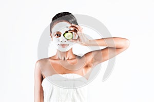 Beautiful African woman in Studio with facial mask