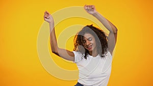 Beautiful Afro-American woman dancing and having fun at party, leisure time