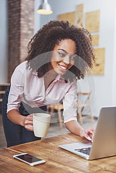 Beautiful Afro-American woman working