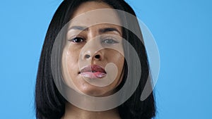 Beautiful Afro Woman Posing Over Blue Background