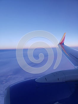 Beautiful airplain scenary, gradiant sky, blue, sunrise photo