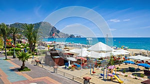 Beautiful Alanya with comfortable beach, green palm trees and blue sea in Antalya Province, Turkey