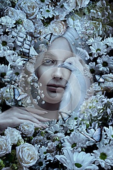 Beautiful albino woman portrait with peacock and flowers background beauty portrait photoshoot