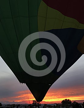 Beautiful Albuquerque sunset with a hot air balloon shadow! photo