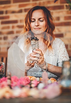 beautiful altar with crystals and rose flowers.