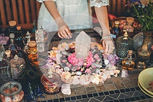 Beautiful altar with crystals and rose flowers