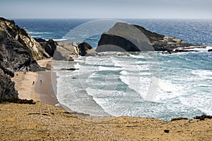 Beautiful Alteirinhos Beach and rock formation next to Zambujeira do Mar, Portugal photo