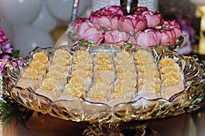 Beautiful amber platter with milk sweets for birthday