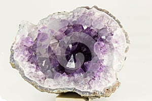 Beautiful amethyst druse a white background