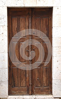 Beautiful ancient door with freeze carved in the wood, in southern France, Provence historic city of Aix en Provence