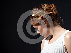 A beautiful ancient goddess from the era of the heroes of Hellas. A young woman